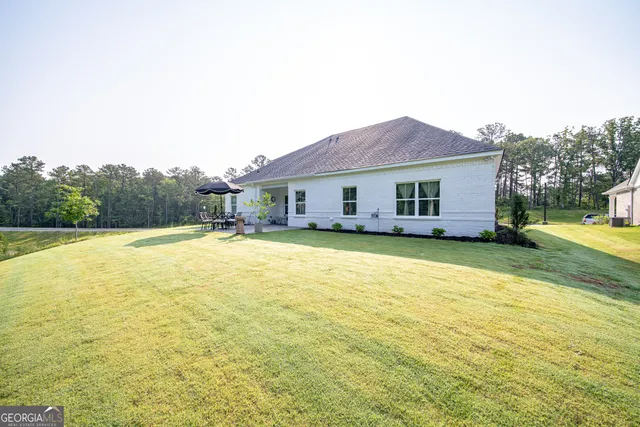 a front view of house with swimming pool