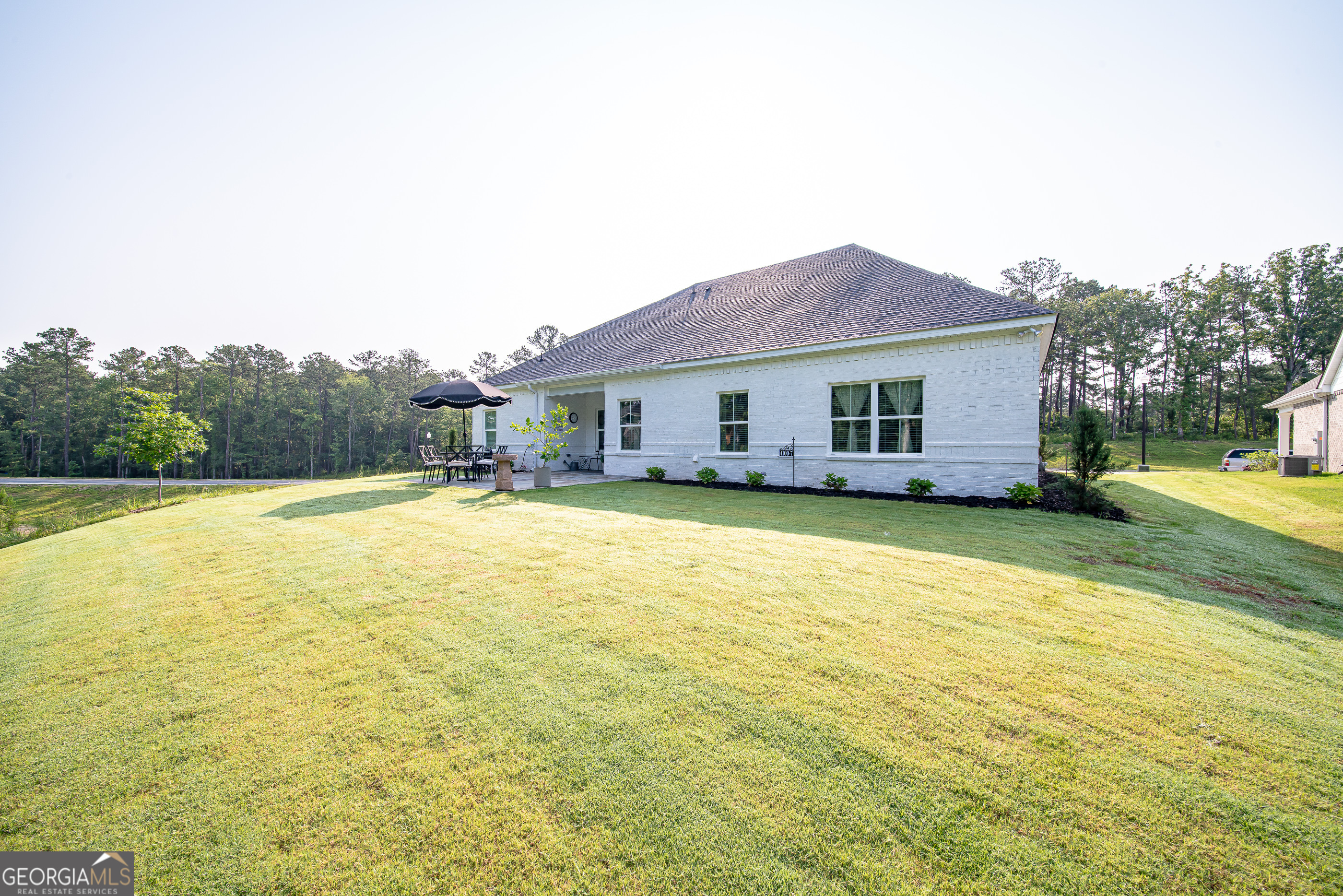 96 Cypress Trail Fortson, GA 31808 - Photo 8 of 62 a house view with swimming pool in front of it