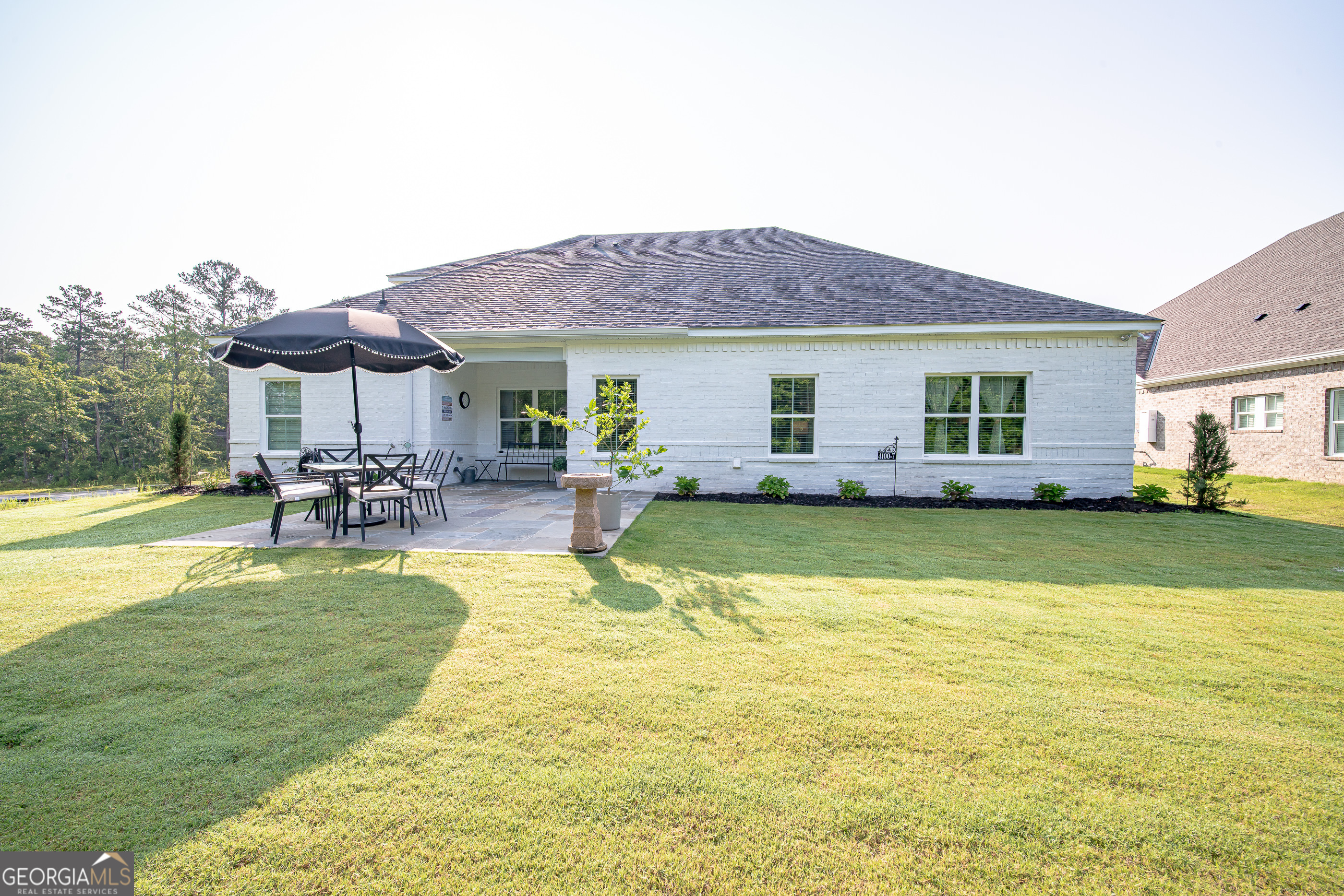 96 Cypress Trail Fortson, GA 31808 - Photo 9 of 62 a view of swimming pool with outdoor seating and a yard