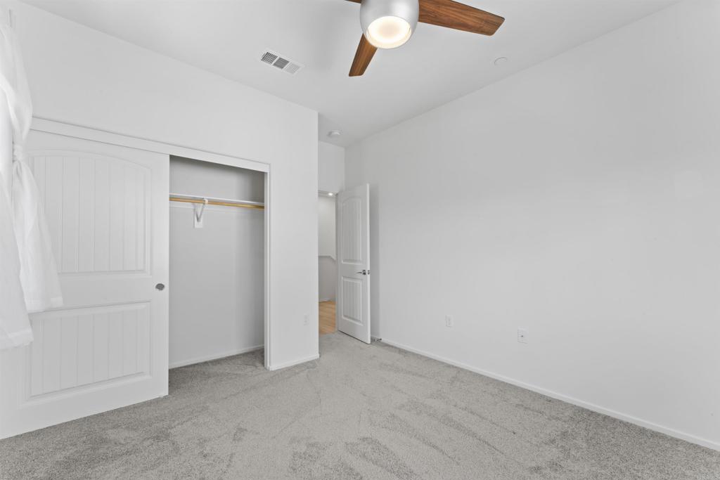 30320 Town Square Drive Menifee, CA 92584 - Photo 11 of 28 an empty room with a bathroom