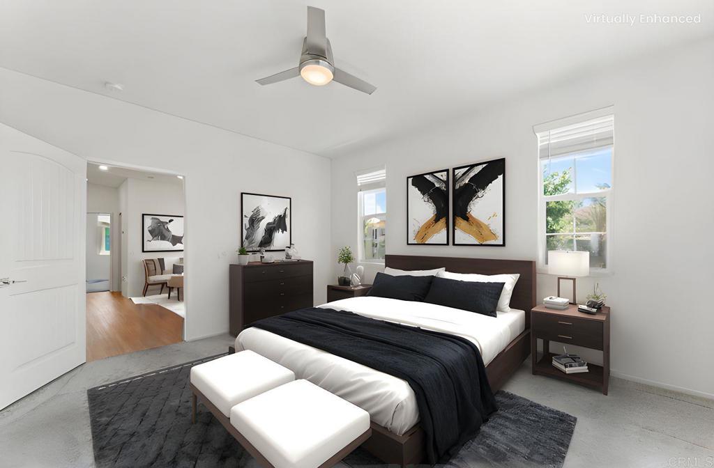 30320 Town Square Drive Menifee, CA 92584 - Photo 12 of 28 a bedroom with a bed and wooden floor