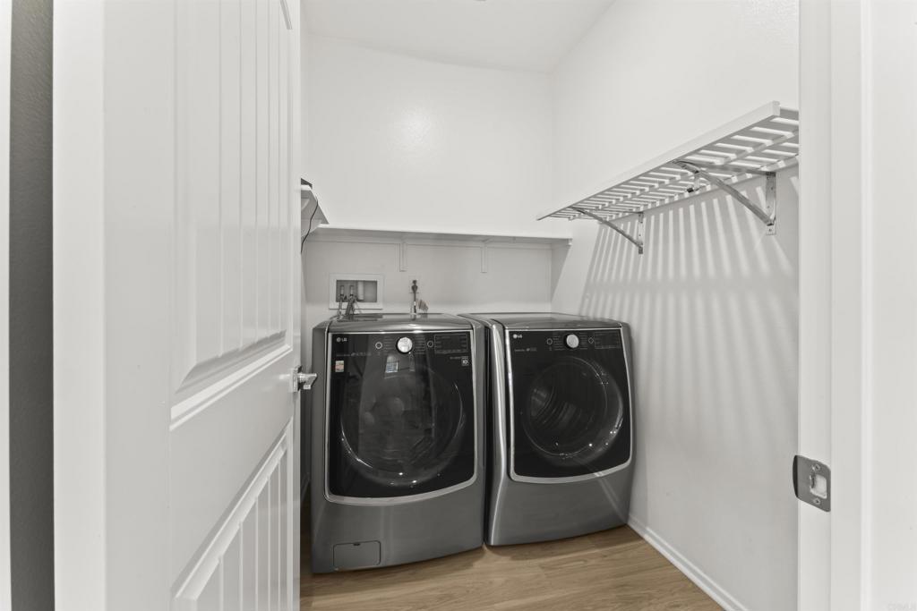 30320 Town Square Drive Menifee, CA 92584 - Photo 7 of 28 a utility room with a washer and dryer