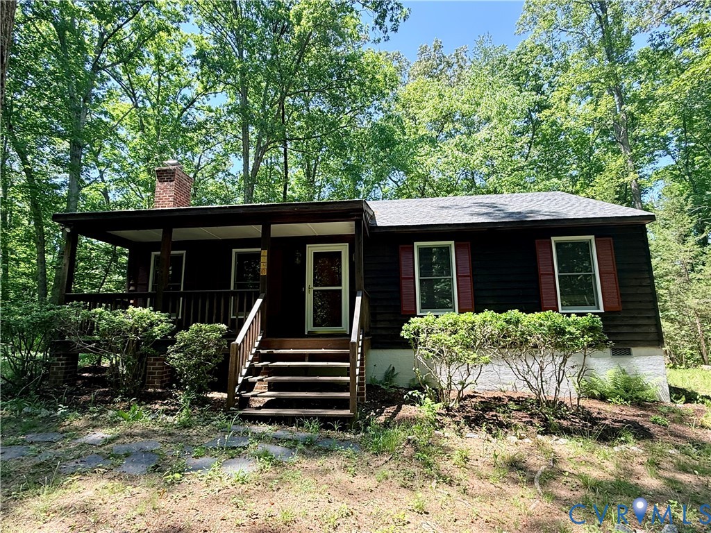 2590 Davis Mill Road Goochland, VA 23063 - Photo 26 of 33 front view of a house with a yard