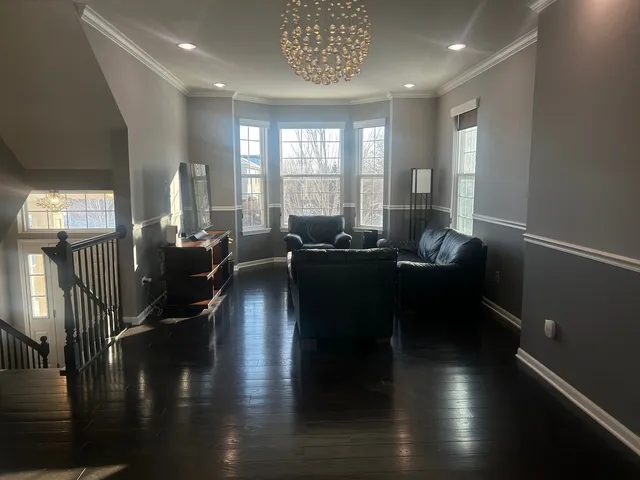 a view of a living room and dining room