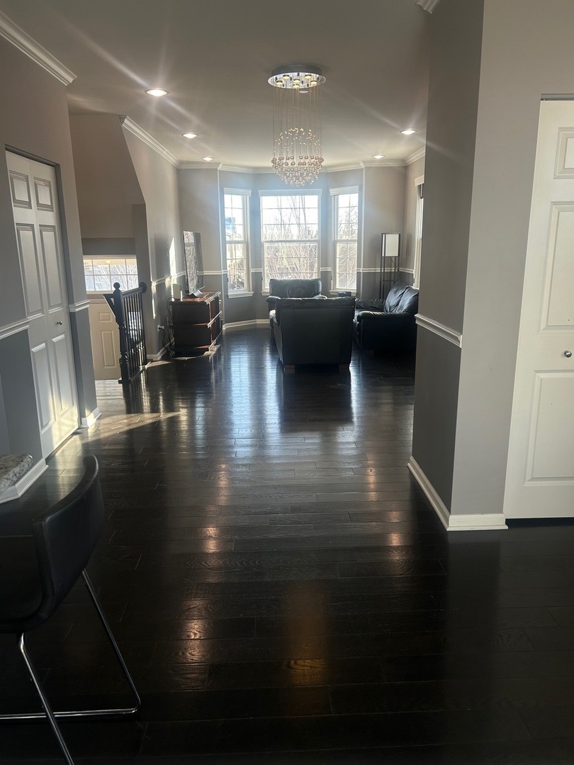 2995 Henley Lane, Unit 2995 Naperville, IL 60540 - Photo 7 of 24 a view of a living room and dining room