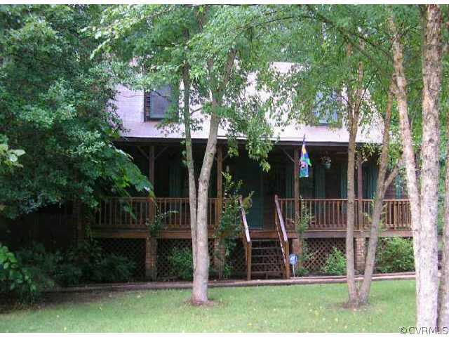 2625 Colgrave Road Midlothian, VA 23112 - Photo 1 of 1 a view of a house with a yard and a large tree