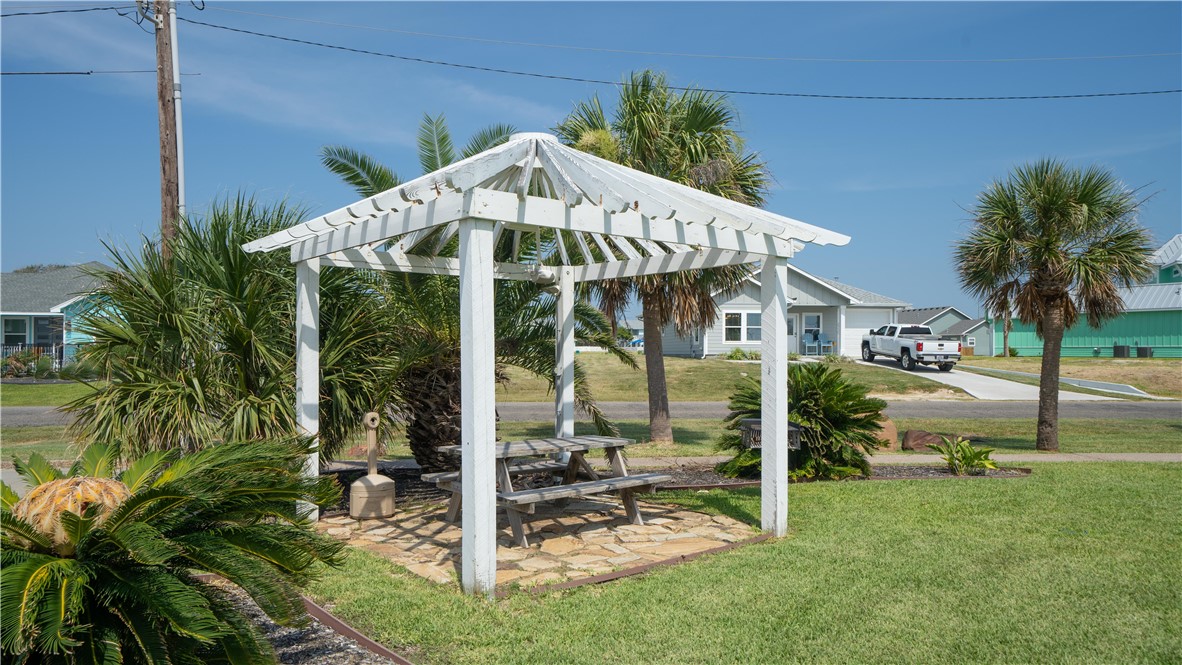 2290 North Fulton Beach Road Rockport, TX 78382 - Photo 23 of 26 a view of a house with backyard