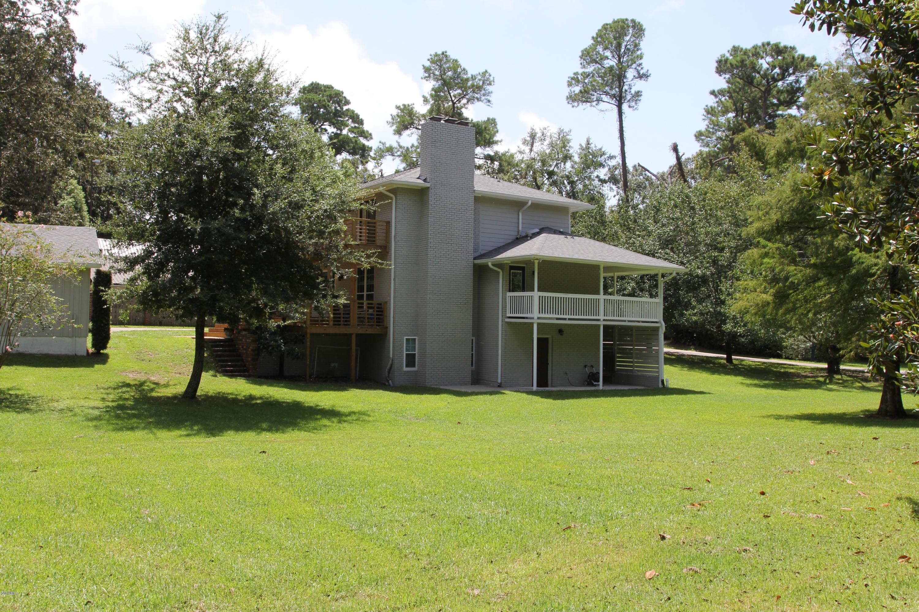 5812 Ridge Road Ocean Springs, MS 39564 - Photo 2 of 36 Side