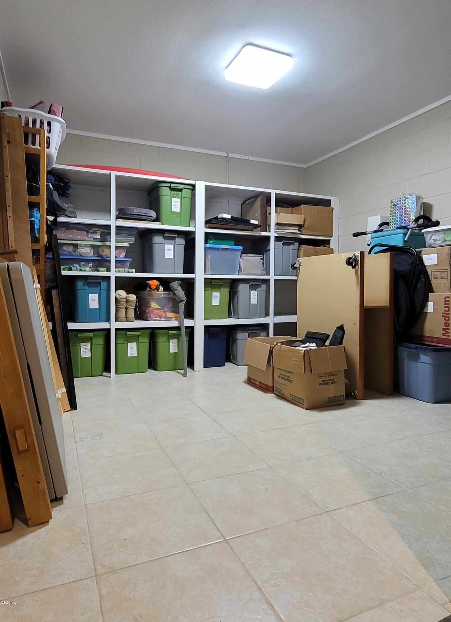 5812 Ridge Road Ocean Springs, MS 39564 - Photo 36 of 36 Basement Storage Room