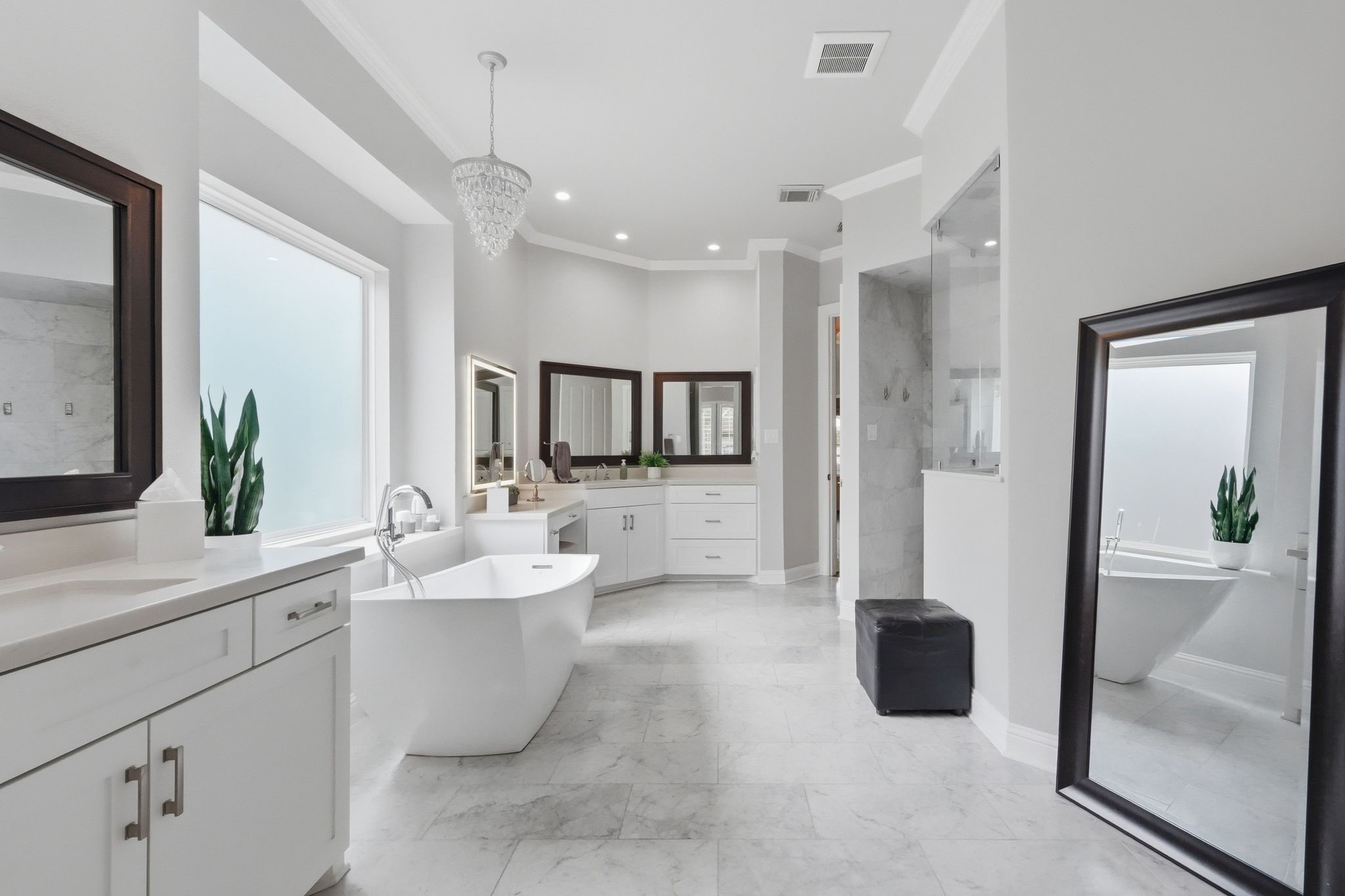 18 Dusk Valley Court Spring, TX 77379 - Photo 16 of 50 Gorgeous primary bathroom with double vanities, soaking tub and huge shower!