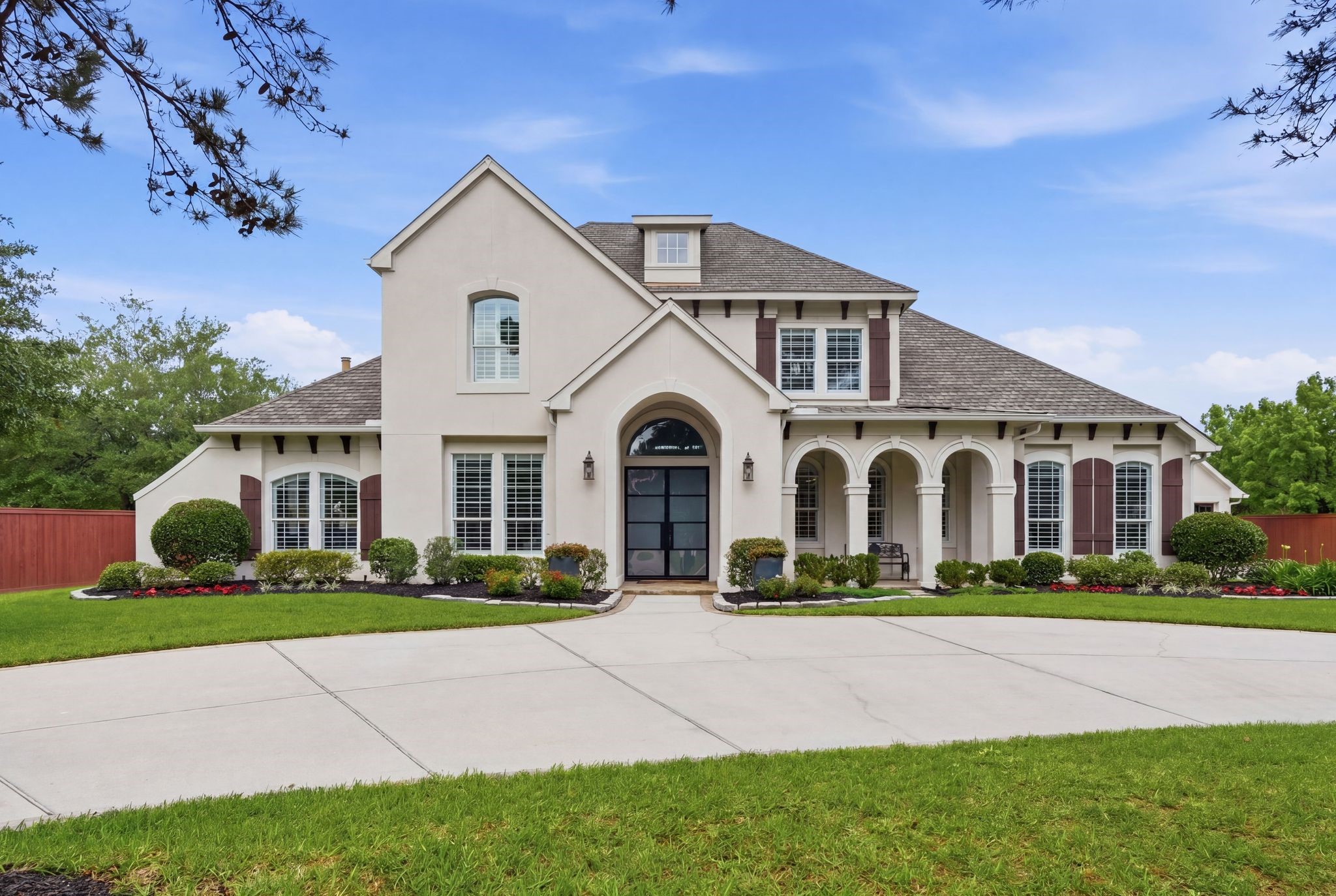 18 Dusk Valley Court Spring, TX 77379 - Photo 2 of 50 Horseshoe driveway for convenient parking and in and out access for guests