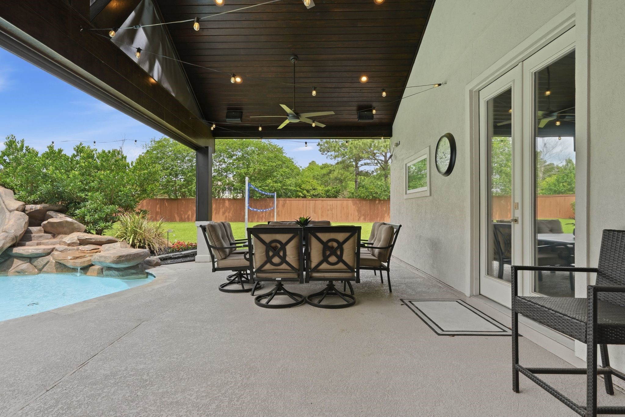 18 Dusk Valley Court Spring, TX 77379 - Photo 42 of 50 A second, covered patio, with solar screen added in 2017