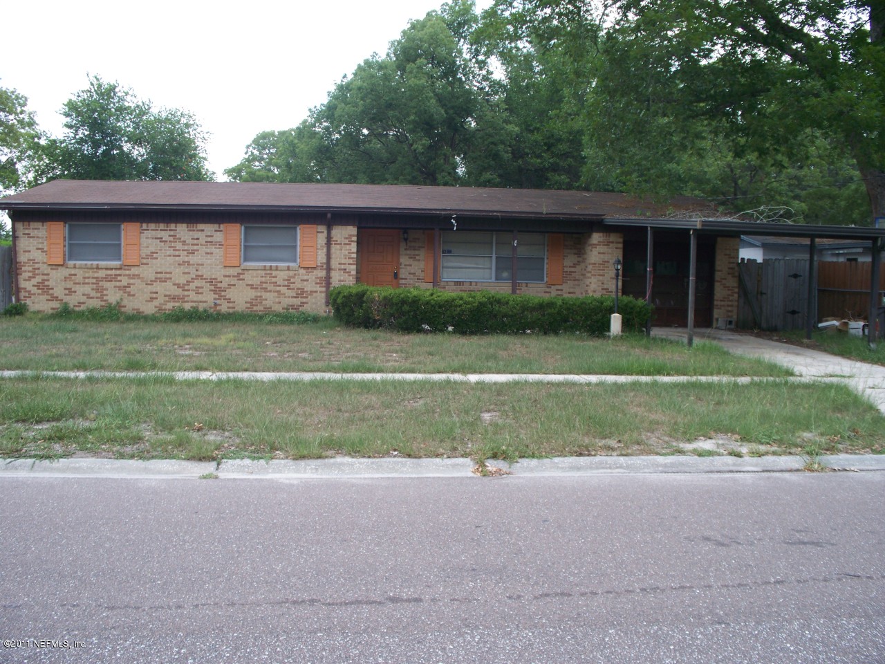 5752 Rover Drive Jacksonville, FL 32244 - Photo 1 of 16 a front view of house with yard and green space