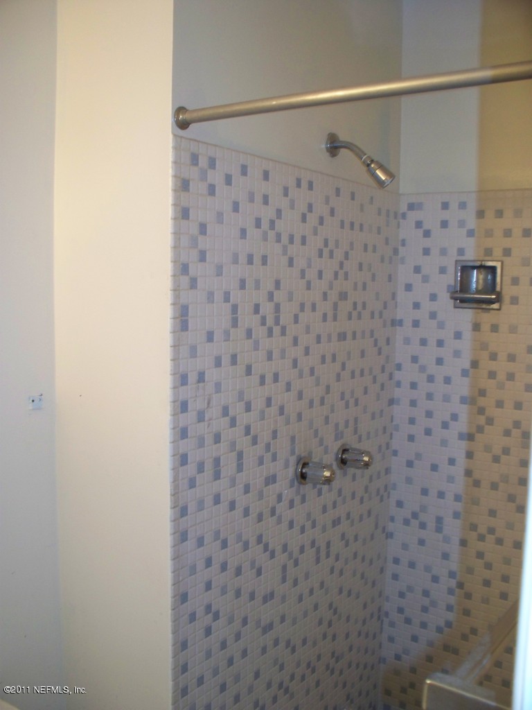 5752 Rover Drive Jacksonville, FL 32244 - Photo 13 of 16 a bathroom with a shower