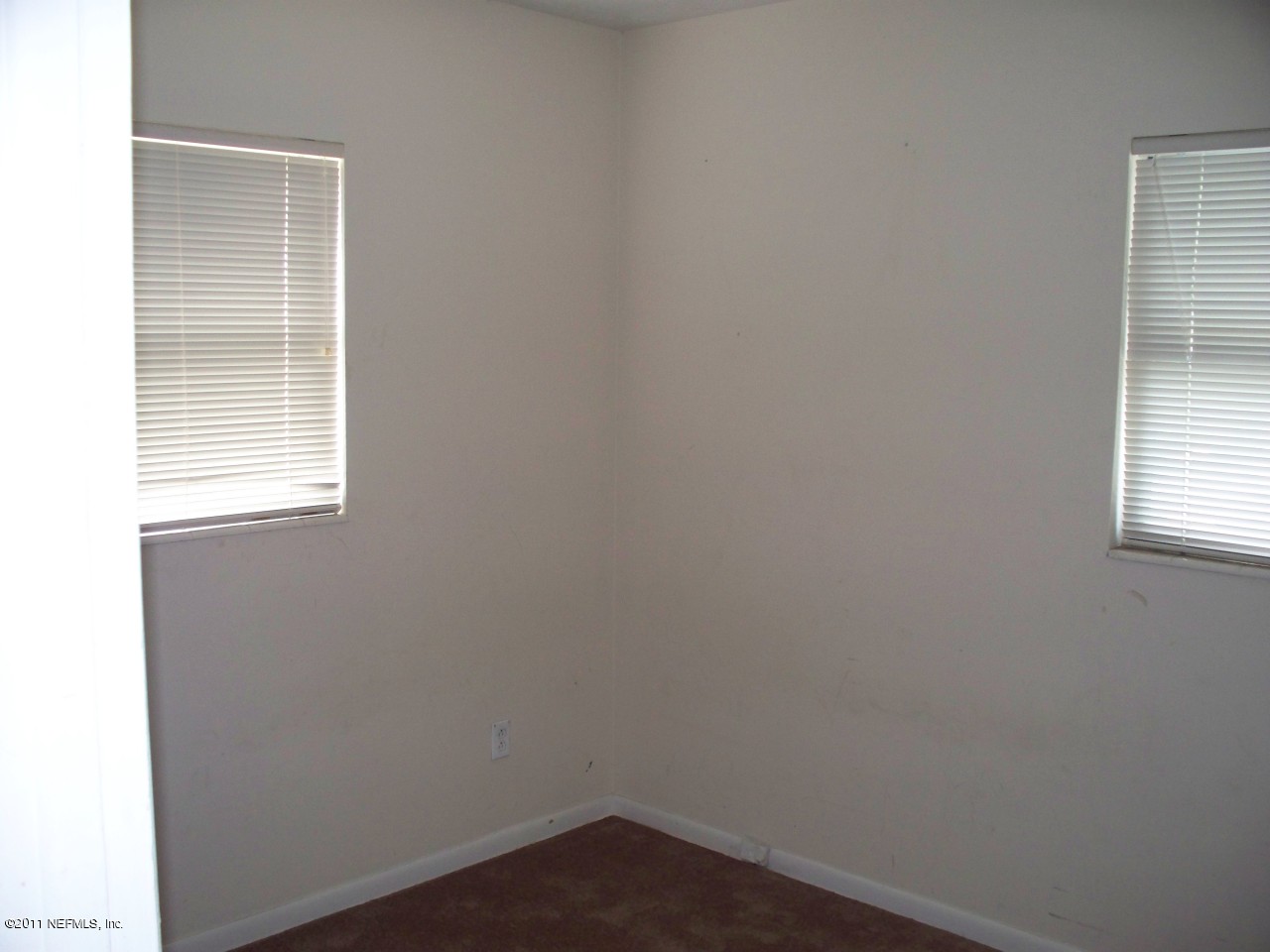 5752 Rover Drive Jacksonville, FL 32244 - Photo 16 of 16 an empty room with a window