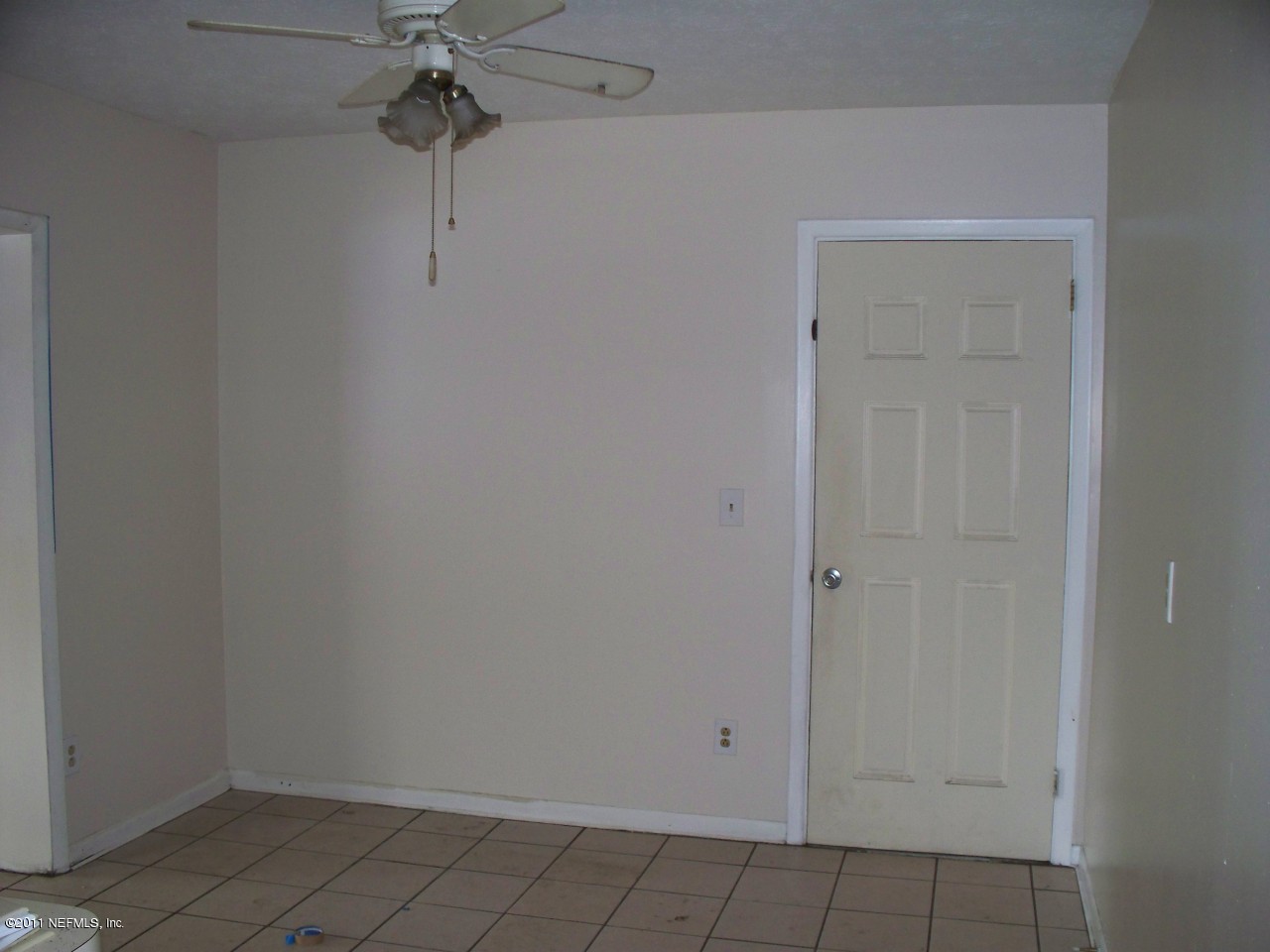 5752 Rover Drive Jacksonville, FL 32244 - Photo 3 of 16 a view of a storage & utility room with racks on the wall