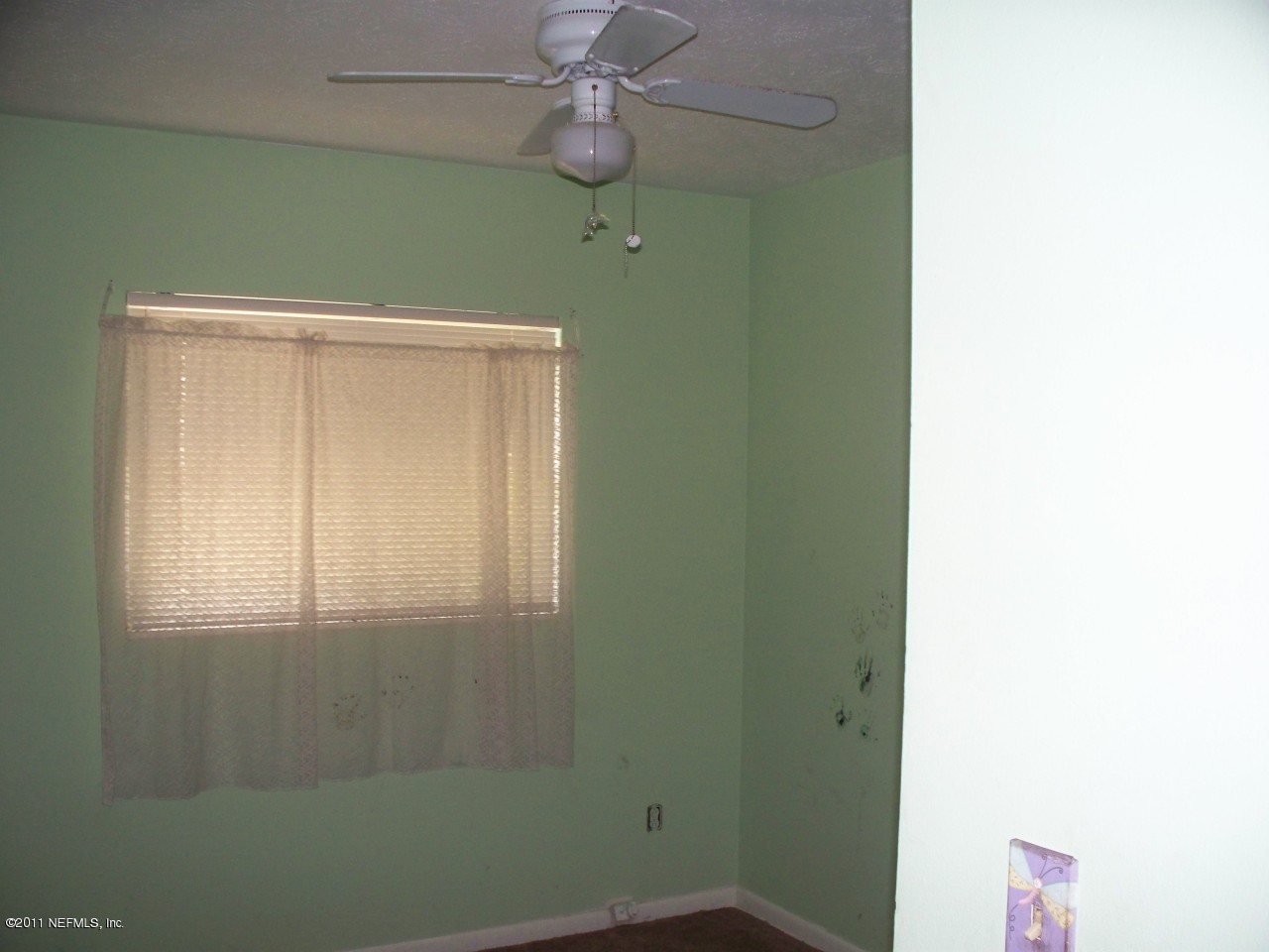5752 Rover Drive Jacksonville, FL 32244 - Photo 8 of 16 a bathroom with a window and a shower