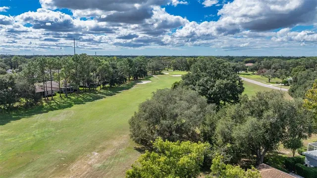 a view of a lake with a yard