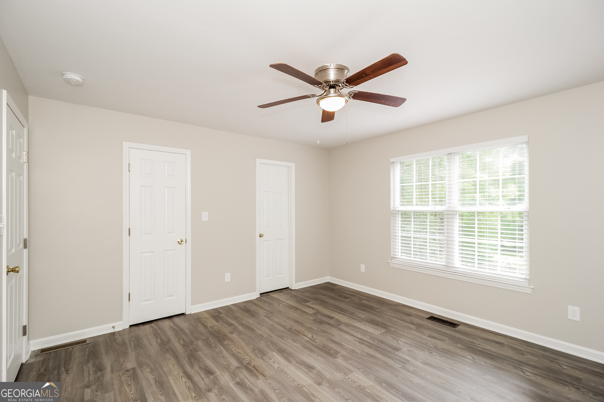 266 Amy Boulevard Temple, GA 30179 - Photo 9 of 17 a view of a livingroom with a window and wooden floor