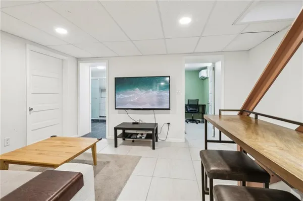 a bedroom with a bed and a table in it