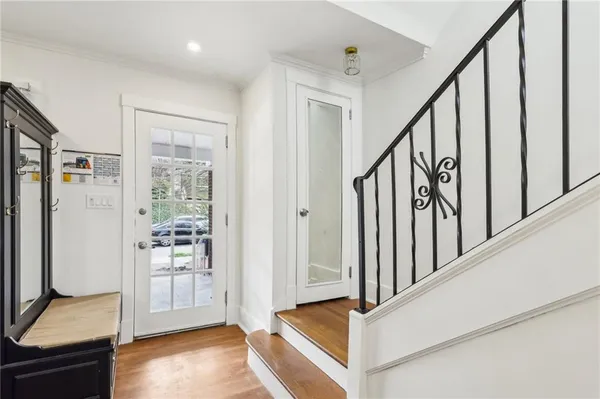 a view of entryway with stairs and furniture