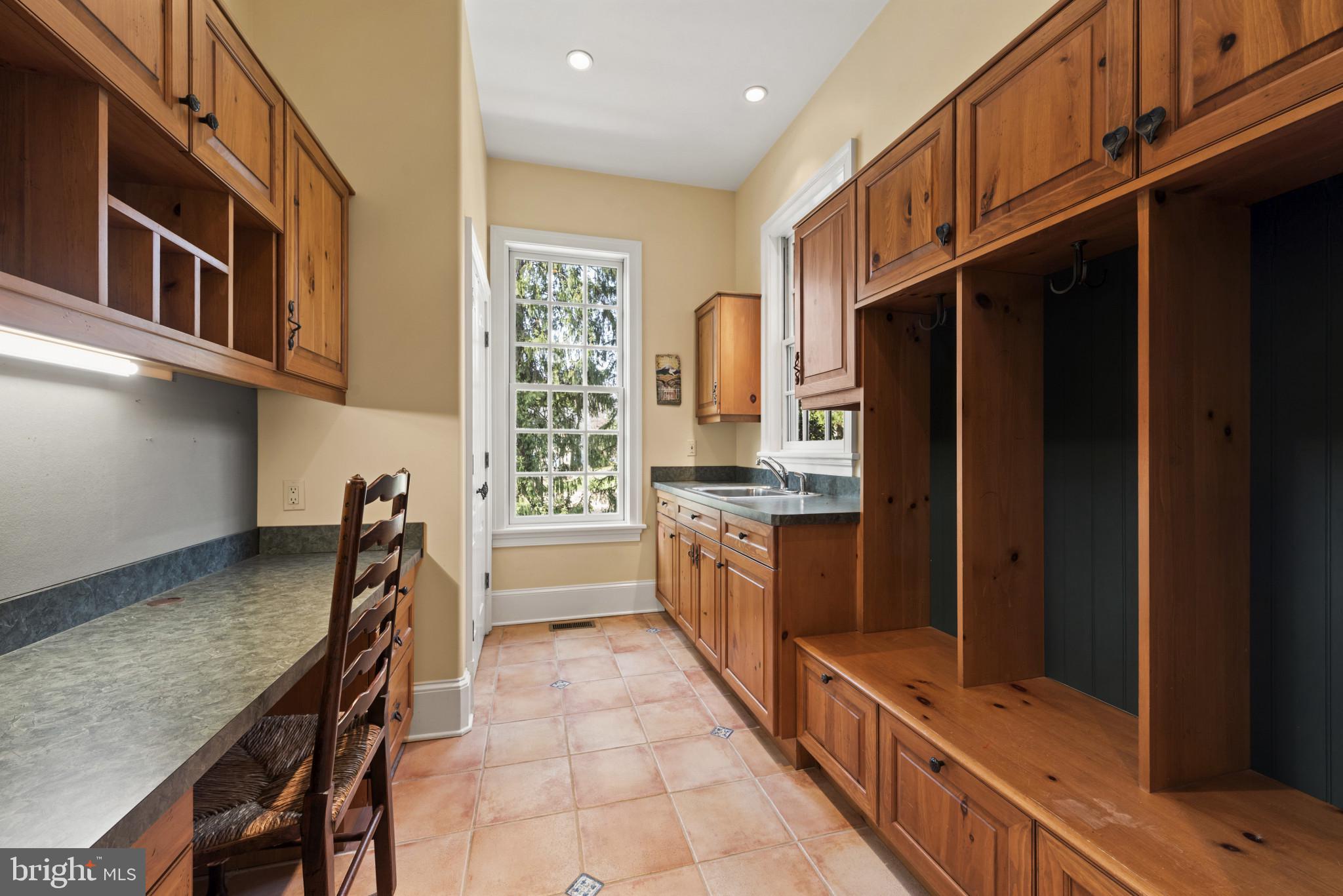 7810 Ruxwood Road Ruxton, MD 21204 - Photo 45 of 94 Pactical mud room off garage with desk and cubbies