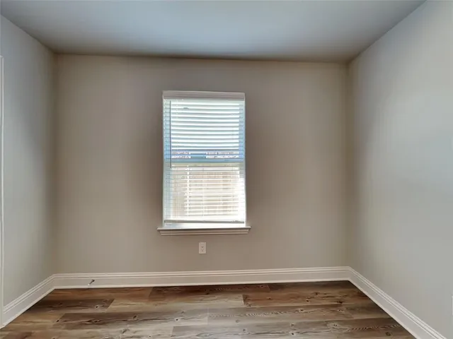 a view of a room that has a window