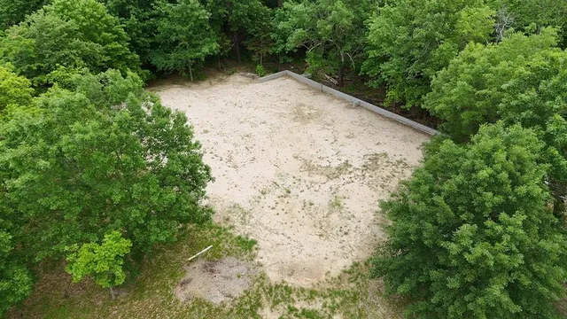 a view of a swimming pool with a garden