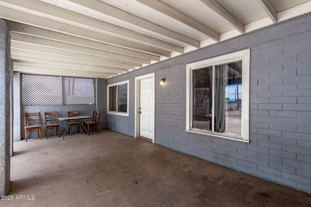 a view of a livingroom with furniture and roof deck