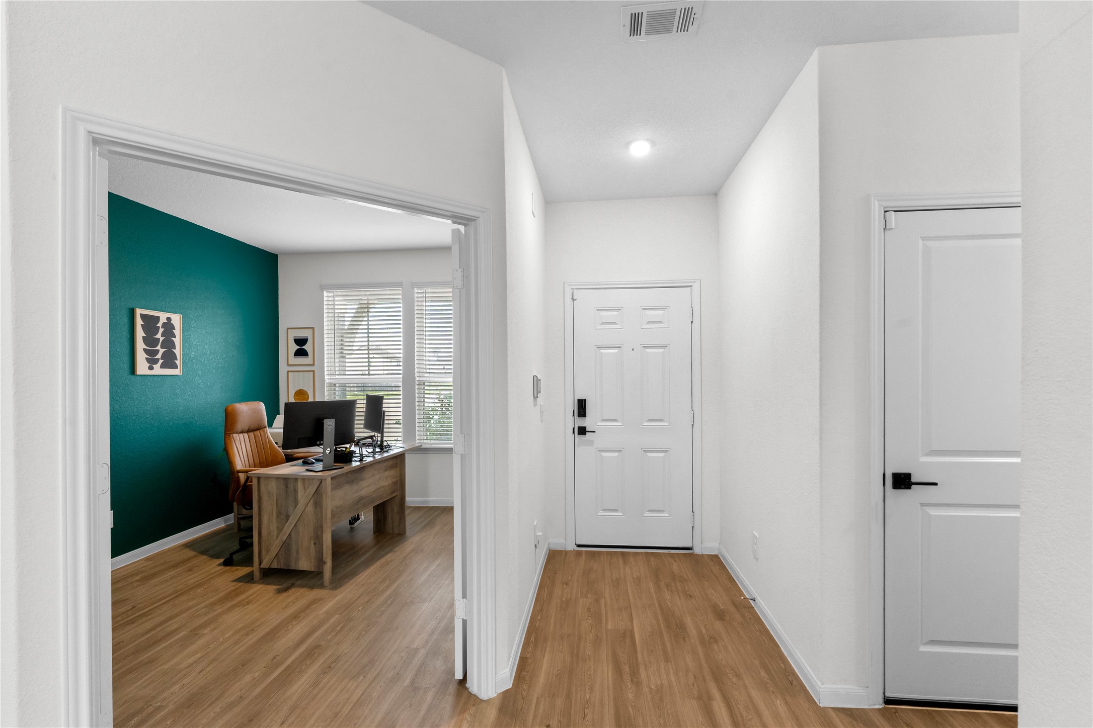 23439 Wrexham Street Spring, TX 77373 - Photo 13 of 26 Office/study and front hallway.