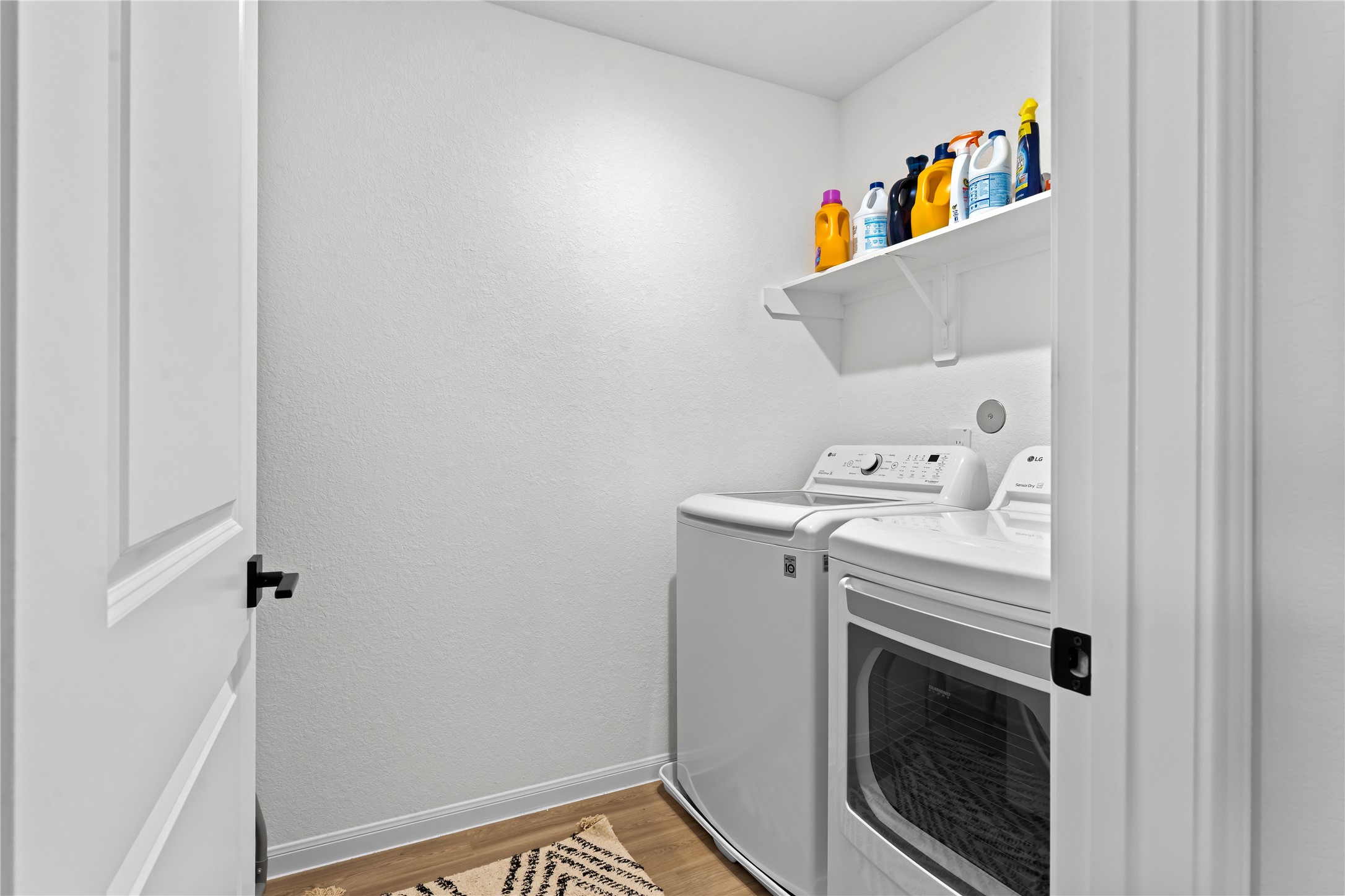 23439 Wrexham Street Spring, TX 77373 - Photo 23 of 26 a utility room with dryer and washer