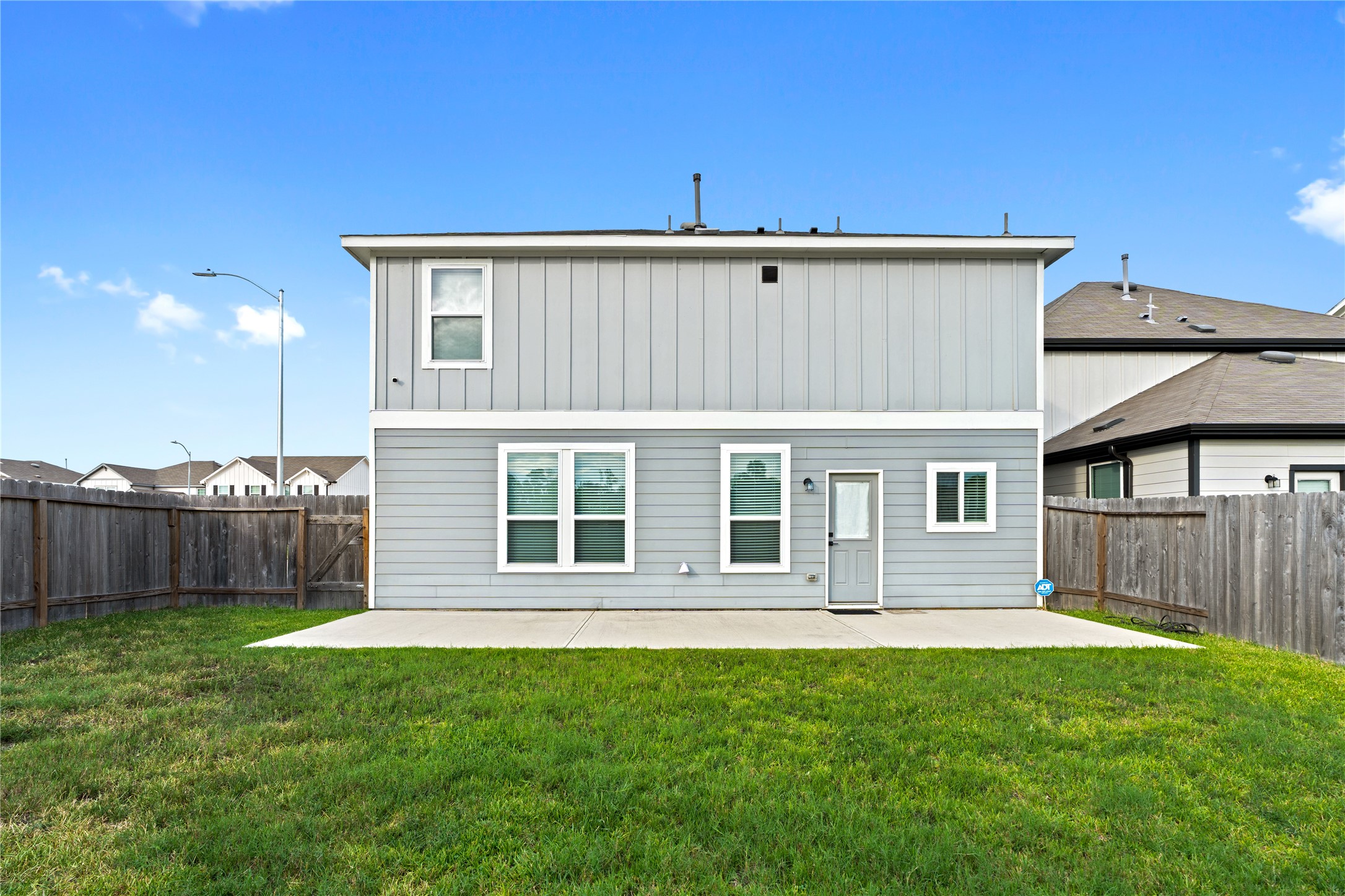 23439 Wrexham Street Spring, TX 77373 - Photo 24 of 26 a front view of a house with a yard