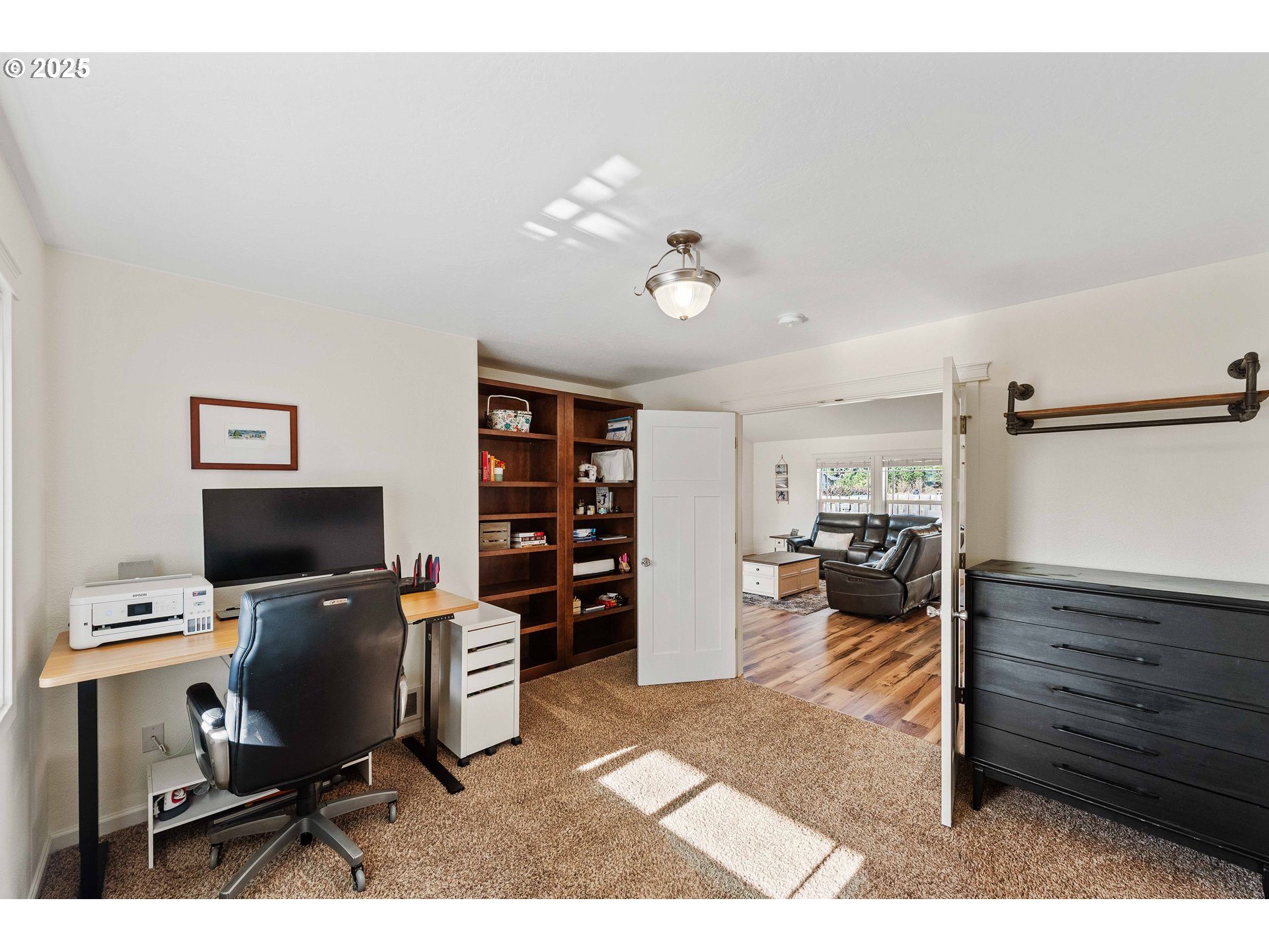 2669 Cedar Loop Bandon, OR 97411 - Photo 20 of 48 a view of a livingroom with workspace and a couch