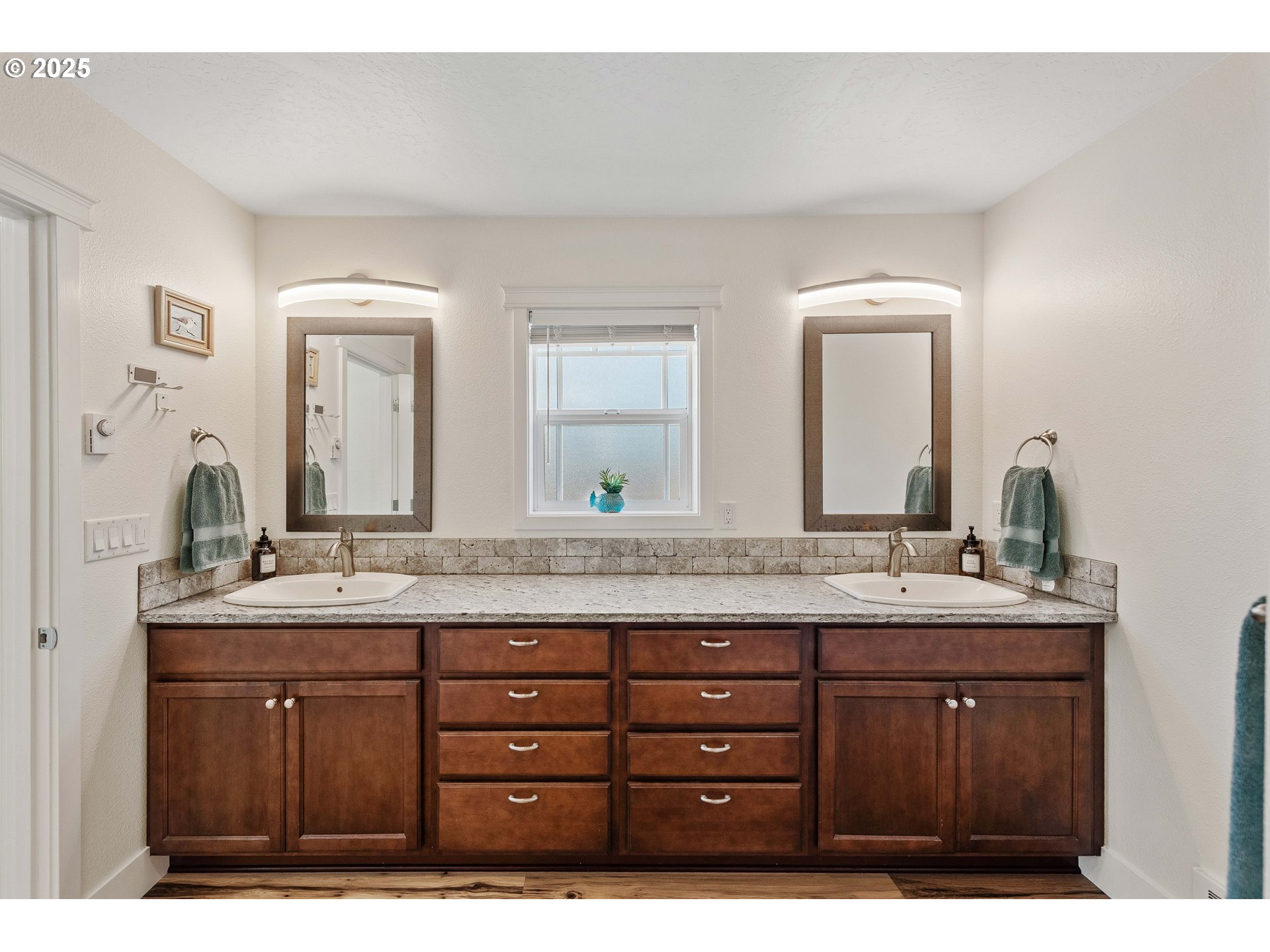 2669 Cedar Loop Bandon, OR 97411 - Photo 31 of 48 a bathroom with a granite countertop sink mirror and double