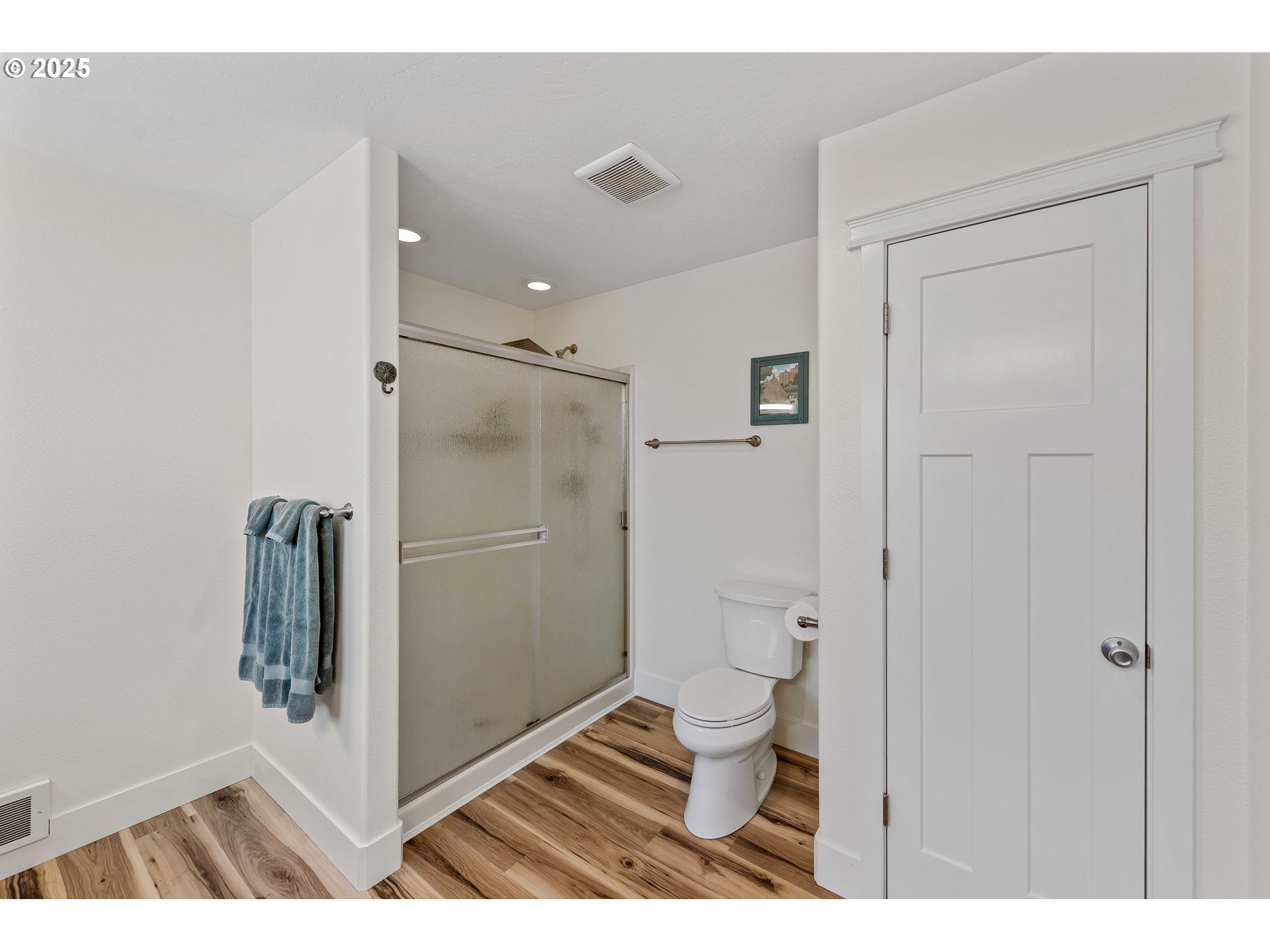 2669 Cedar Loop Bandon, OR 97411 - Photo 32 of 48 a bathroom with a toilet and a shower