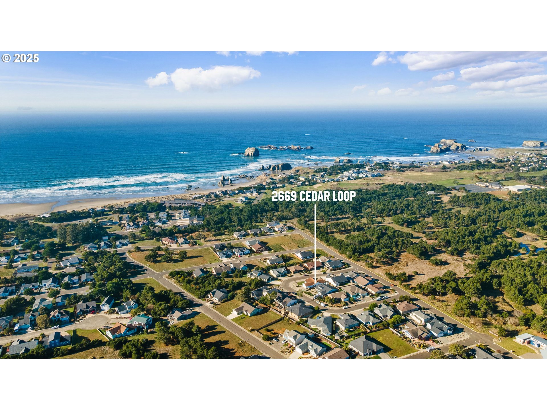 2669 Cedar Loop Bandon, OR 97411 - Photo 46 of 48 an aerial view of a city