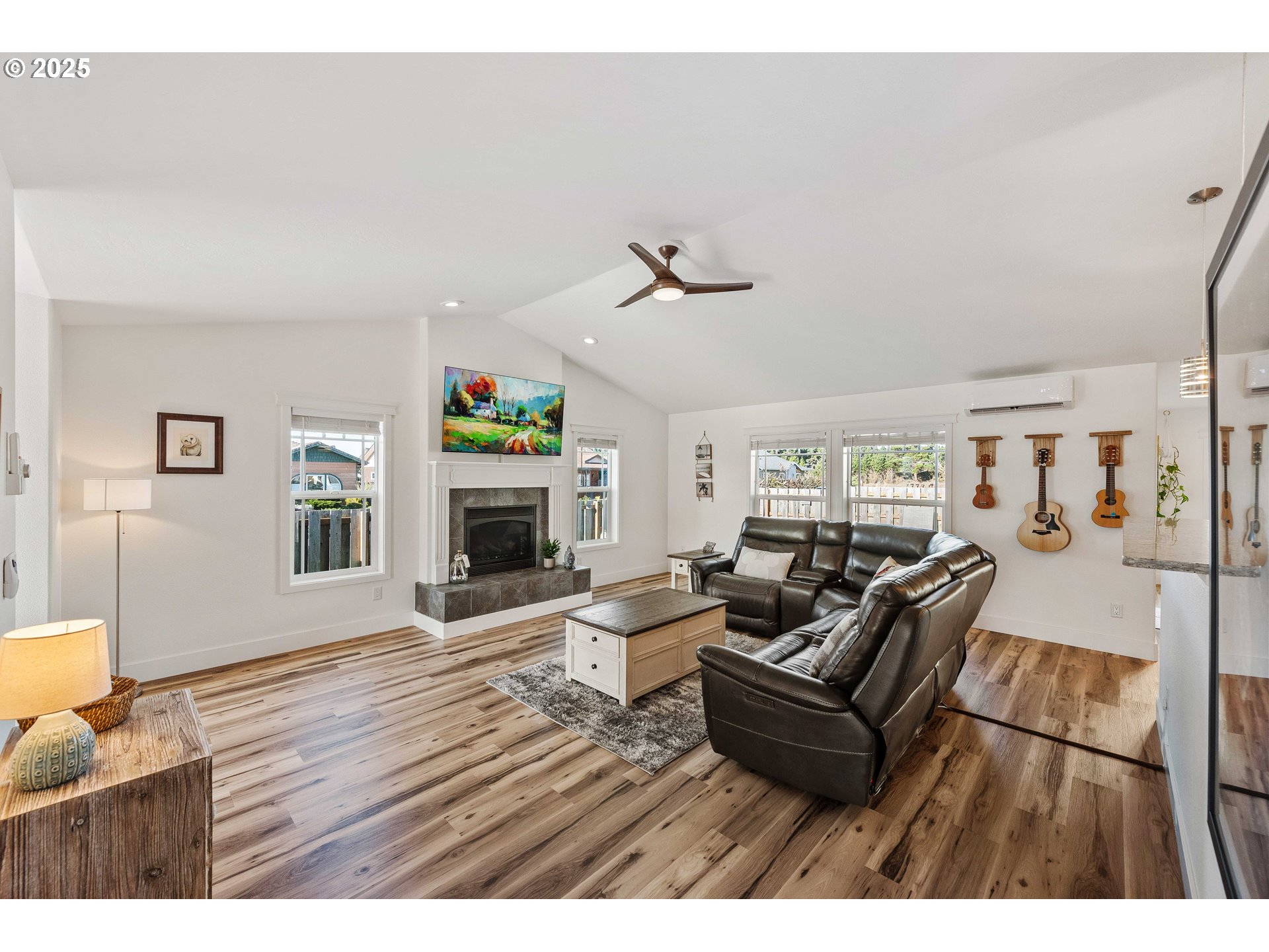 2669 Cedar Loop Bandon, OR 97411 - Photo 7 of 48 a living room with furniture and a fireplace