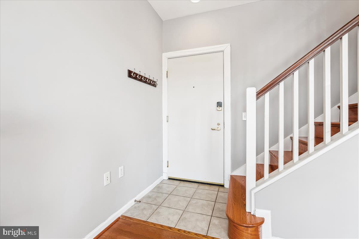 343 Cedar Street Northwest, Unit 323 Washington, DC 20012 - Photo 14 of 71 a view of an entryway with staircase