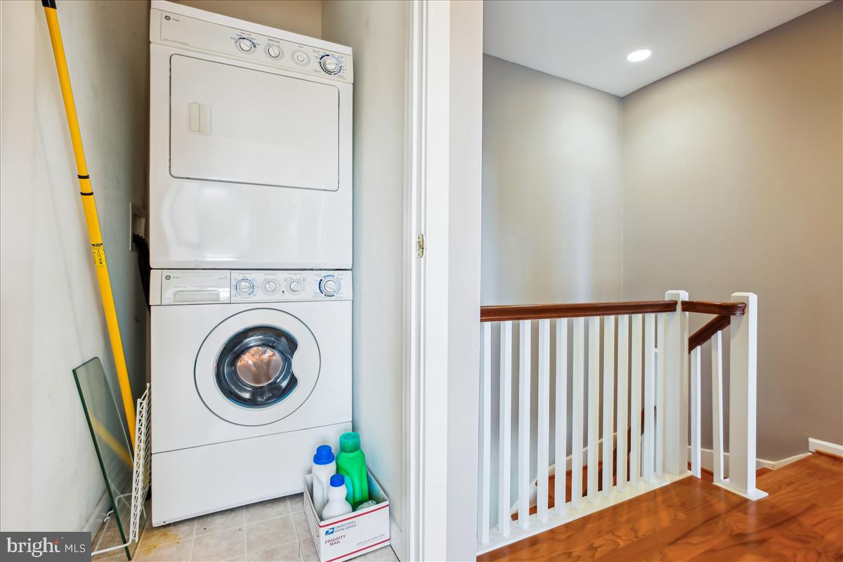 343 Cedar Street Northwest, Unit 323 Washington, DC 20012 - Photo 34 of 71 a utility room with dryer and washer