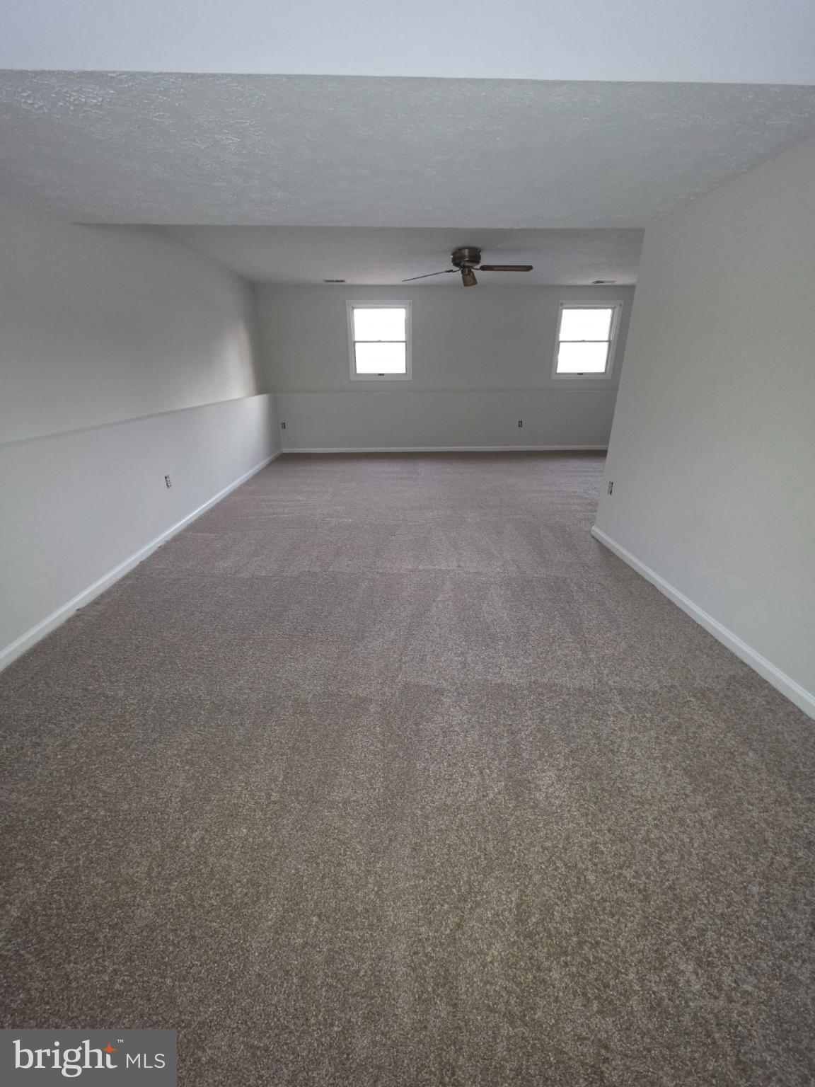 10854 Green View Way Columbia, MD 21044 - Photo 5 of 8 a view of an empty room and window