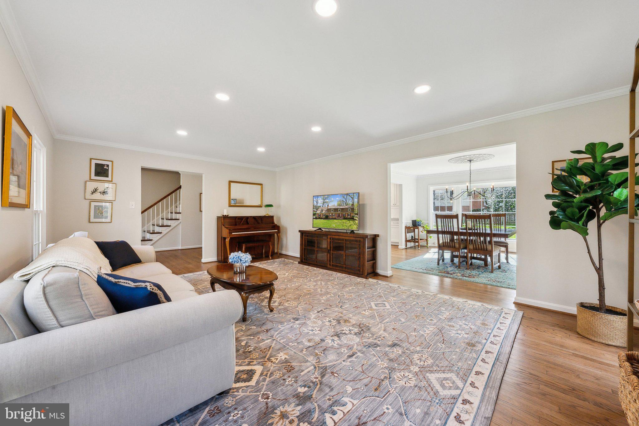 2623 Steeplechase Drive Reston, VA 20191 - Photo 13 of 69 a living room with fireplace furniture and a wooden floor