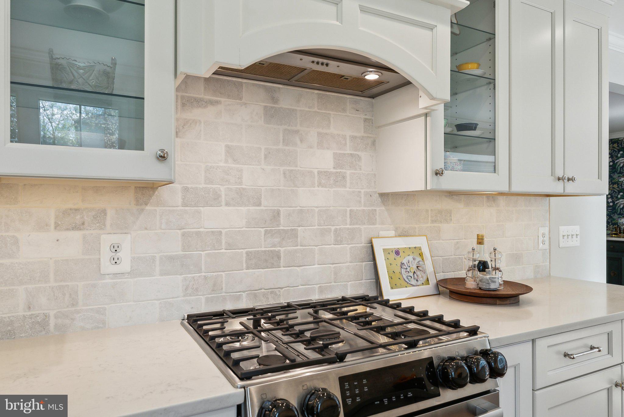 2623 Steeplechase Drive Reston, VA 20191 - Photo 14 of 69 a stove top oven sitting inside of a kitchen