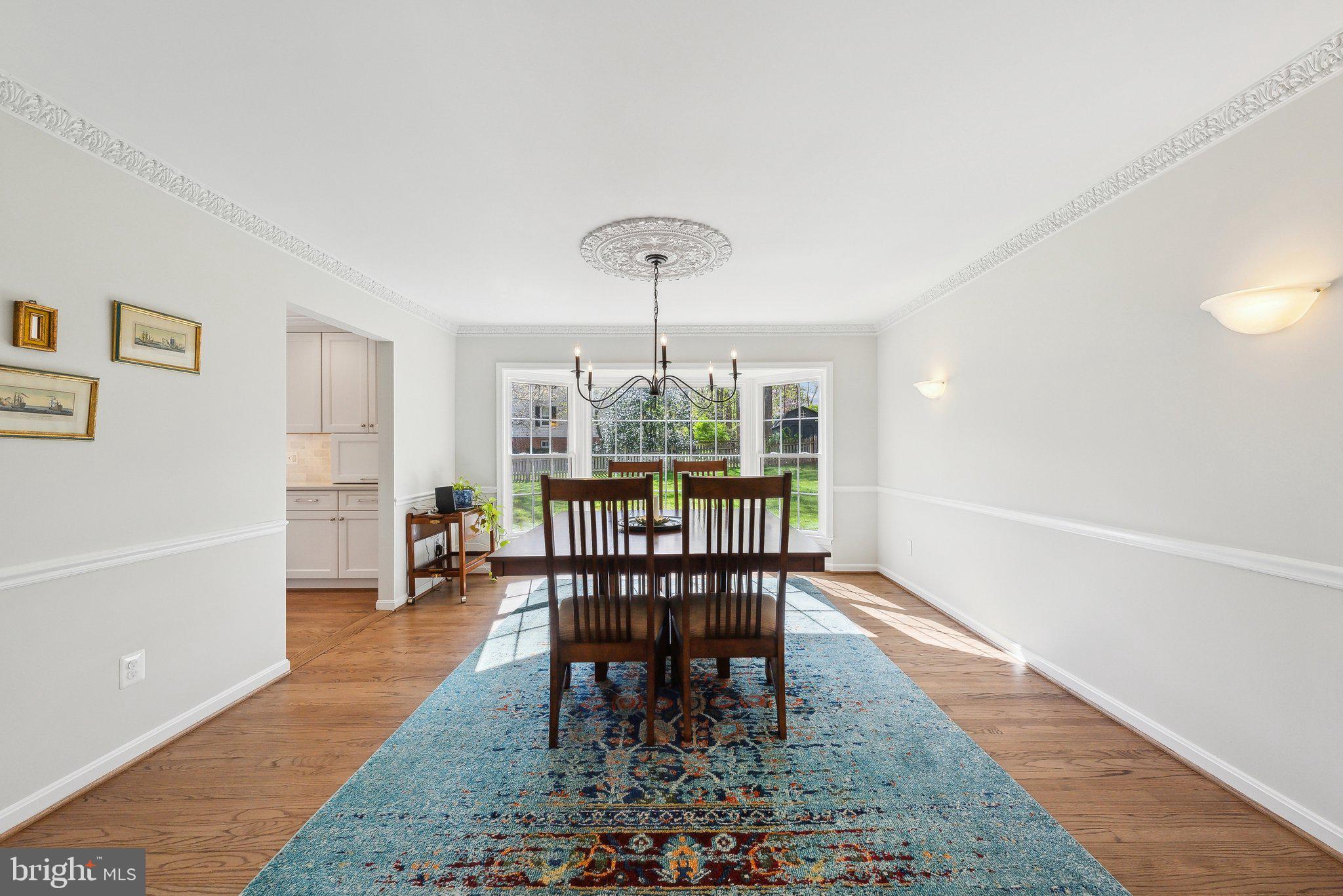 2623 Steeplechase Drive Reston, VA 20191 - Photo 22 of 69 a dining room with furniture window and wooden floor