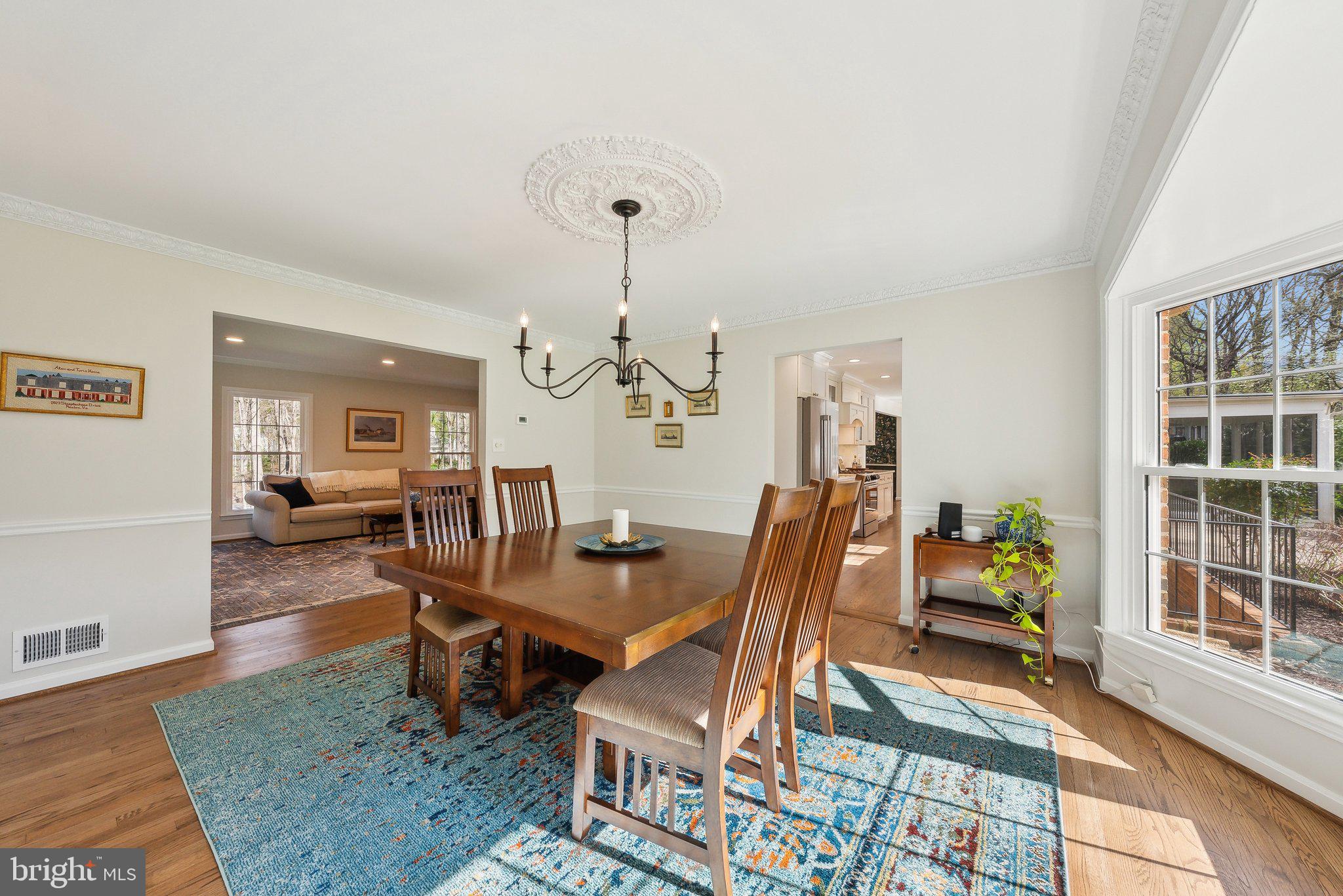 2623 Steeplechase Drive Reston, VA 20191 - Photo 23 of 69 a living room with furniture and a table