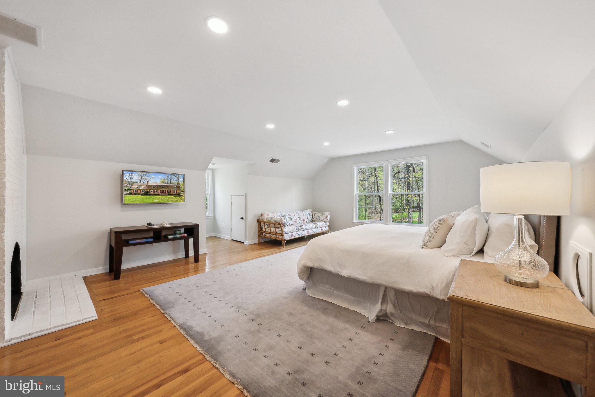 2623 Steeplechase Drive Reston, VA 20191 - Photo 28 of 69 a living room with furniture and a table