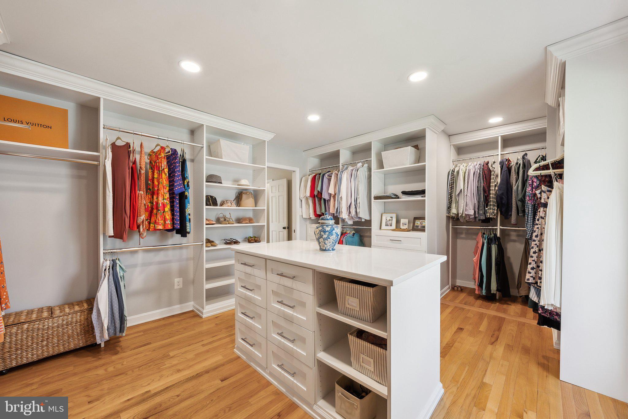 2623 Steeplechase Drive Reston, VA 20191 - Photo 32 of 69 a kitchen with stainless steel appliances a refrigerator and wooden floor