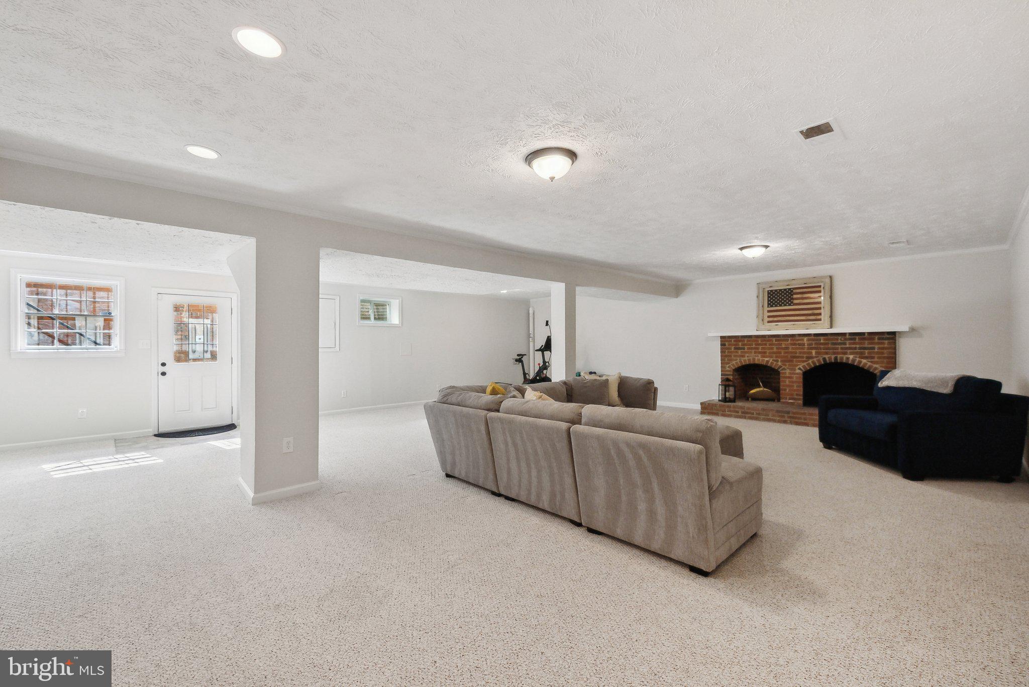 2623 Steeplechase Drive Reston, VA 20191 - Photo 47 of 69 a living room with furniture a couch and a window