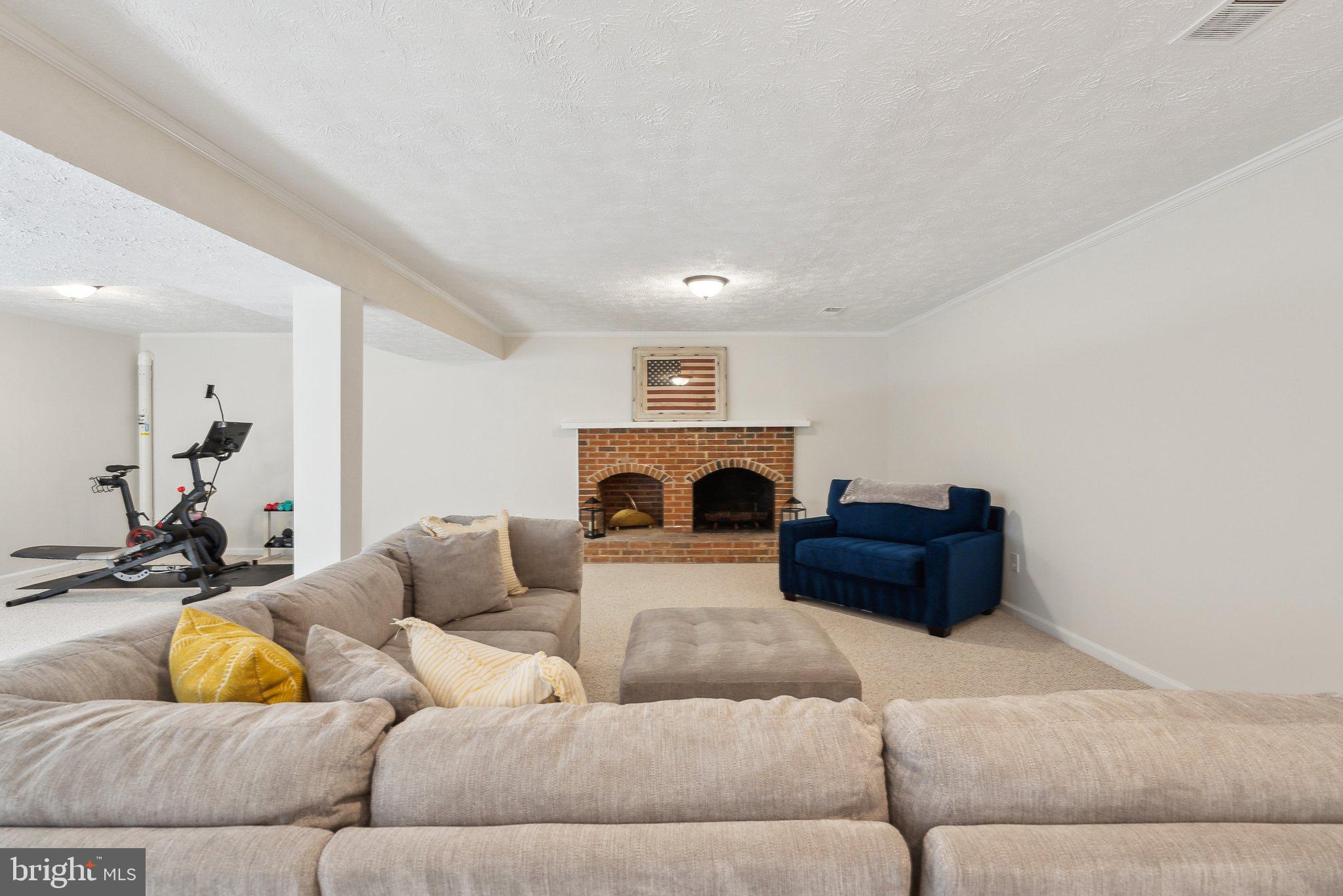2623 Steeplechase Drive Reston, VA 20191 - Photo 48 of 69 a living room with furniture and a couch