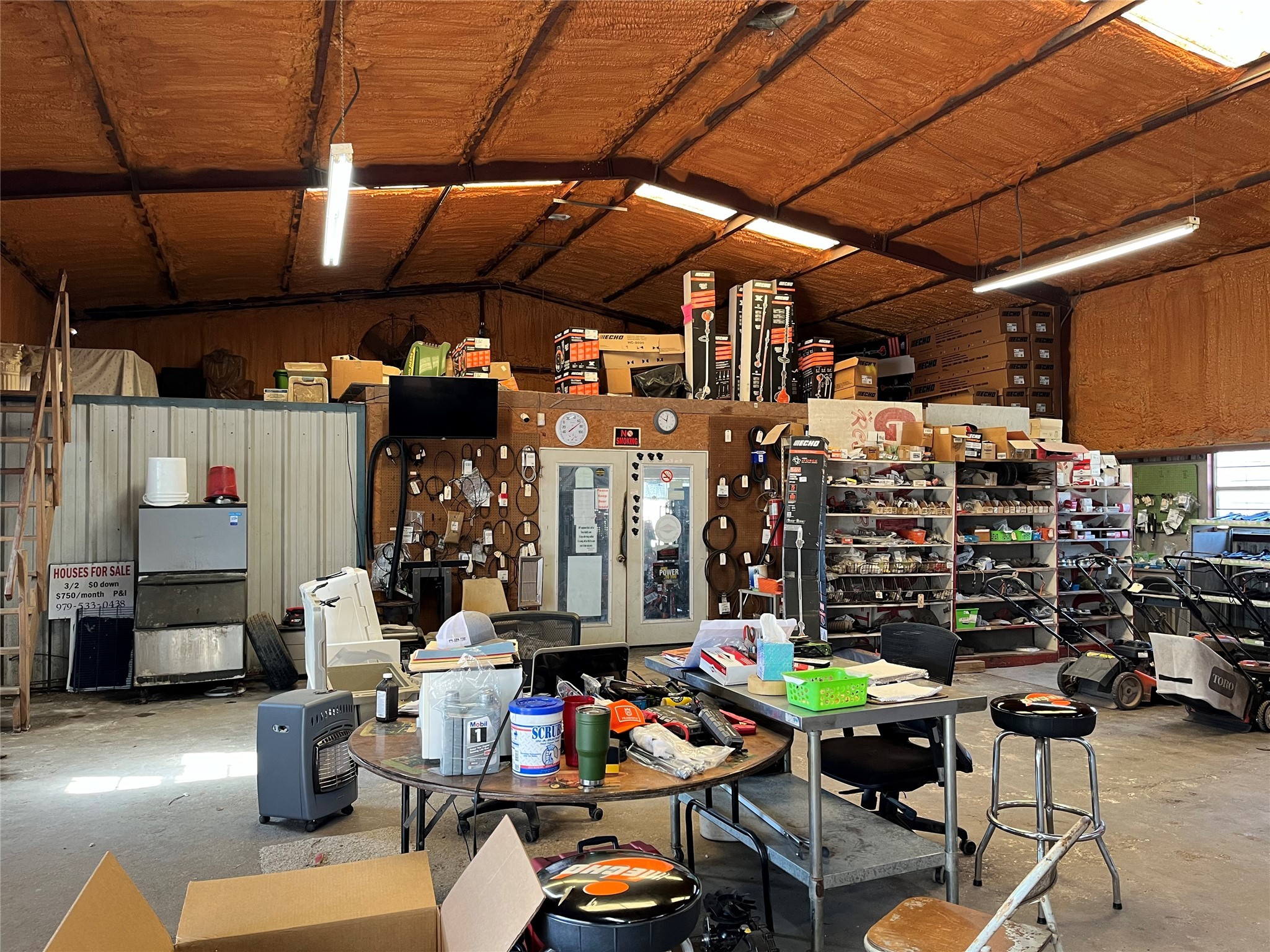 707 East Milam Street Wharton, TX 77488 - Photo 3 of 8 a view of store room with furniture