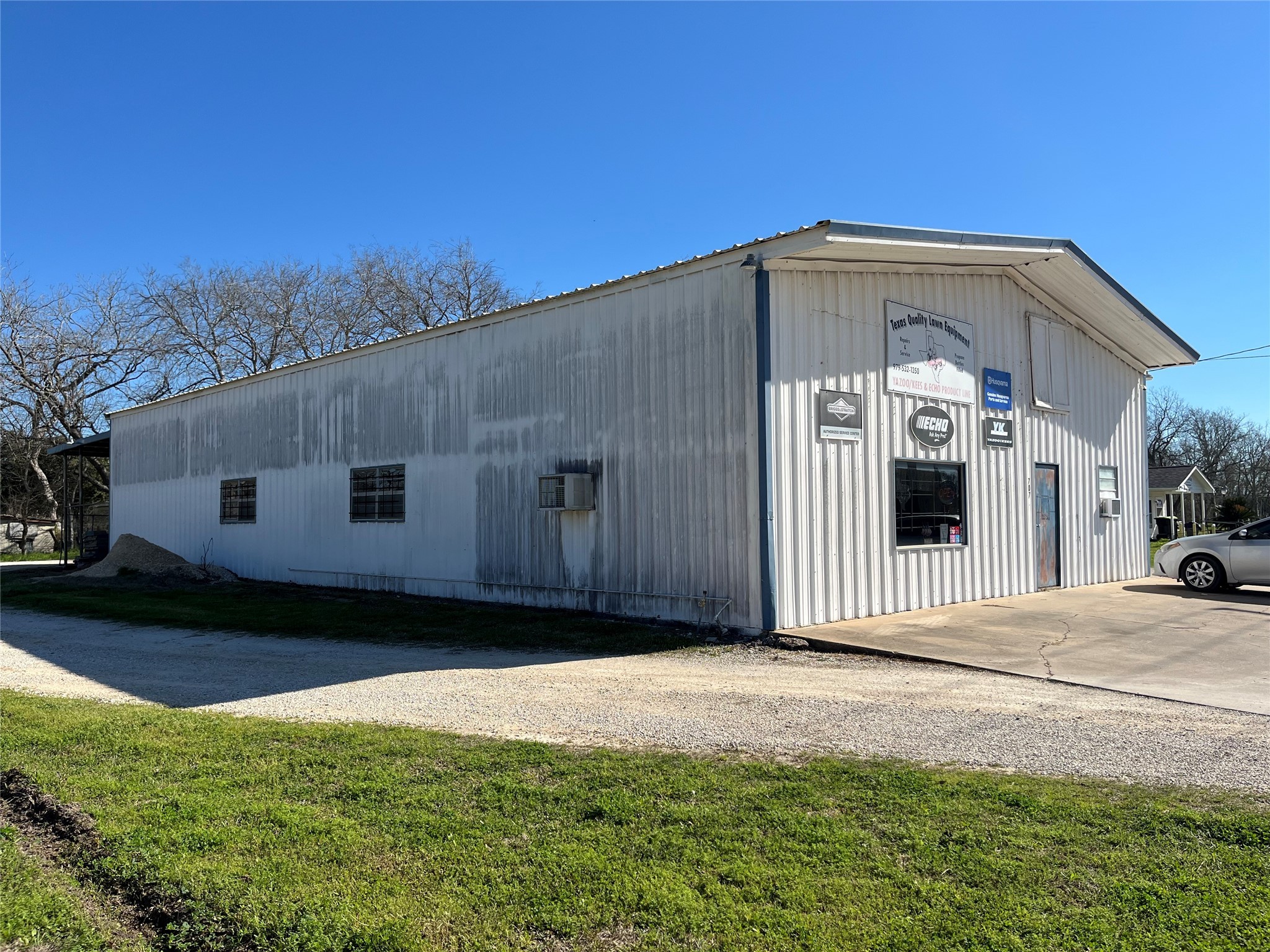707 East Milam Street Wharton, TX 77488 - Photo 6 of 8 a view of a house with a yard